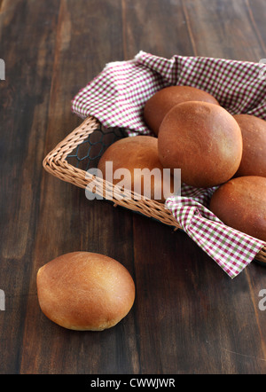 Basket of freshly baked dinner rolls Stock Photo