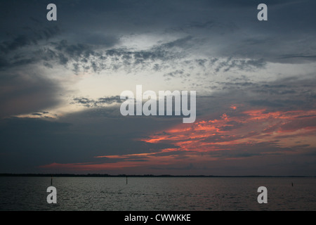 Florida intra coastal waterway sunset cloudy skies picture Stock Photo