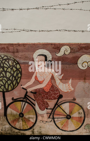 Mae Sot, close to the Burma border. Graffiti on the wall, done by burmese refugees. Stock Photo