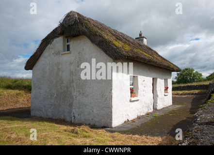 Rustic thatched cottage near Kinvara village, County Galway, Ireland. Stock Photo