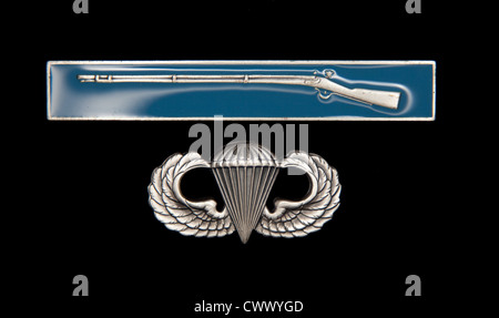 US Army Combat Infantry Badge (CIB) and Airborne badge on black Stock Photo