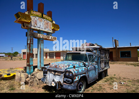 Old truck and sign in front of the abandoned Ranch House Cafe along Route 66 in Tumcumcari, New Mexico Stock Photo