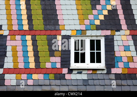 Cladding with coloured fibre cement boards like slate on an old house, Siegerland region, Germany, Europe Stock Photo