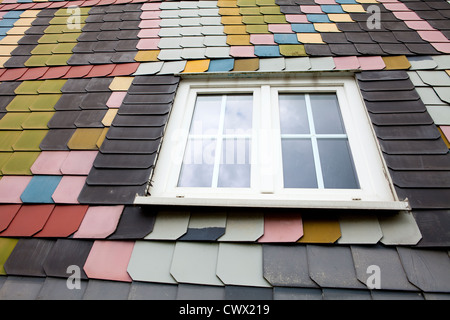 Cladding with coloured fibre cement boards like slate on an old house, Siegerland region, Germany, Europe Stock Photo