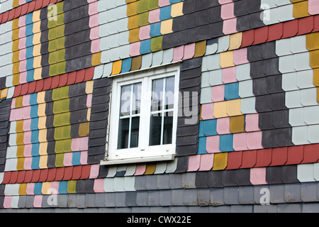 Cladding with coloured fibre cement boards like slate on an old house, Siegerland region, Germany, Europe Stock Photo