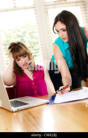2 girls consoling Stock Photo