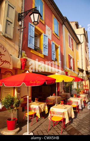 Colorful cafe and street scene in Greoux-les-Bains, Provence France Stock Photo