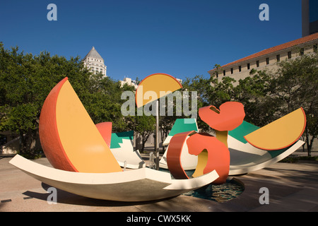 DROPPED BOWL WITH SCATTERED ORANGE SLICES AND PEELS FOUNTAIN METRO DADE PARK MIAMI FLORIDA USA Stock Photo