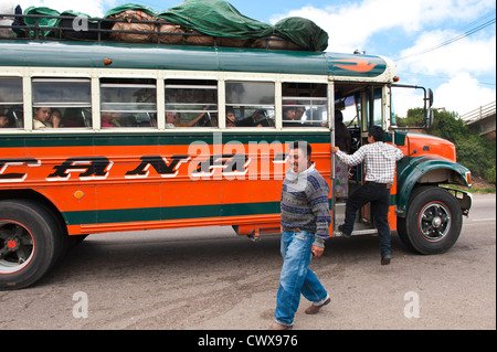 Guatemala, Antigua. Riding a chicken bus in Antigua, Guatemala. Stock Photo