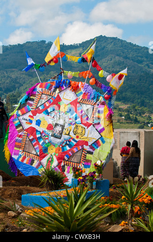 Kites or barriletes, Day Of The Dead, Dia de los Muertos, ceremony in cemetery, Santiago Sacatepequez, Guatemala. Stock Photo