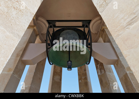 Looking up at the bell in the Siege Bell Memorial erected in 1992 overlooking the Great Harbour of Valletta Island of Malta Stock Photo