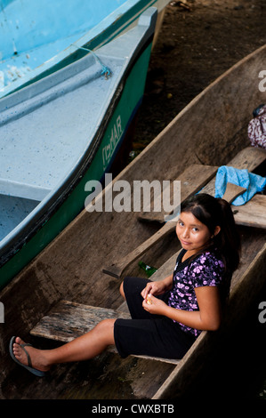 young indigenous native indian garifuna girl paddling a