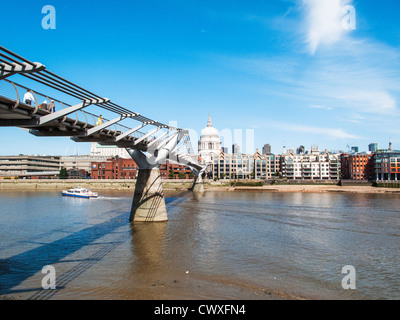 St Paul's Cathedral, London, England - view from the Millennium Bridge, also known as the Wibbly Wobbly Bridge Stock Photo