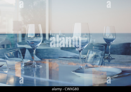 Reflected sea on a restaurant's window. Denia. Alicante. Spain Stock Photo