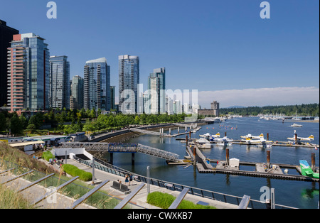 Vancouver Harbour Water Airport and apartments, West Cordova Street and Harbour Green Park, Vancouver, Canada.
