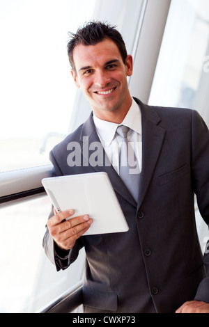 handsome young businessman using tablet computer Stock Photo