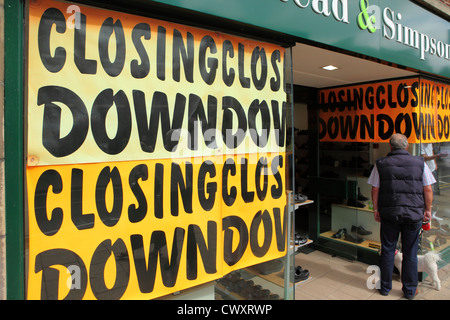 Closing Down signs on a British shop in September 2012. Stock Photo