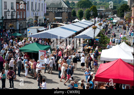 A market in Ludlow castle square during the 2012 Food Festival, Shropshire, England. Stock Photo