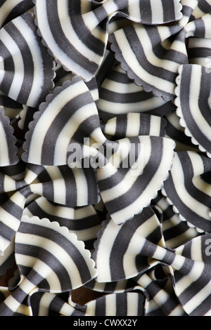 Farfalle Zebra pasta. Flavored coloured Pasta. Specialty pasta Stock Photo