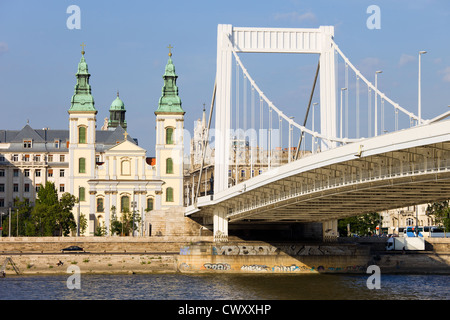 Inner City Parish Church and Elizabeth Bridge by the Danube river in Budapest, Hungary. Stock Photo