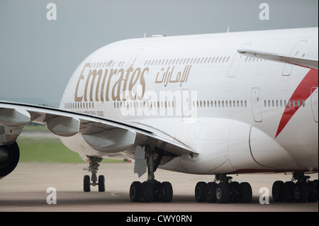A Emirates Airbus A380 taxiing on the runway of Manchester International Airport (Editorial use only) Stock Photo