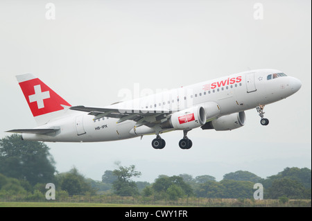 A Swiss International Airlines Airbus A319 taking off from Manchester International Airport (Editorial use only) Stock Photo