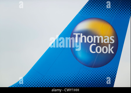 A close up of the Thomas Cook logo on the tail fin of a passenger aircraft (Editorial use only) Stock Photo