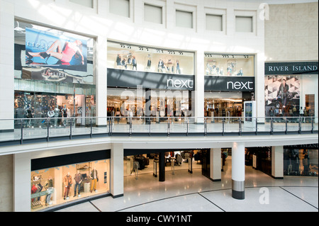 An indoor shot of the entrance / storefront of the Next flagship store in Manchester Arndale Centre. Stock Photo