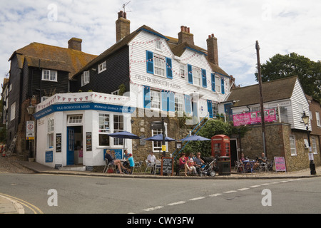 Rye East Sussex England UK Visitors sitting outside Mermaid Corner Tea Rooms part of Old Borough Arms Guest House on Strand Quay Stock Photo