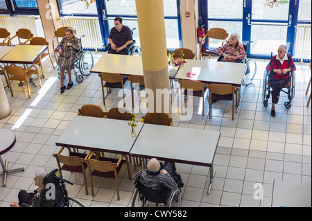 Wheelchaired residents in retirement home EHPAD, Strasbourg Alsace France Europe Stock Photo