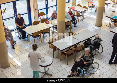 Wheelchaired senior residents in retirement home, EHPAD French nursing home, Strasbourg Alsace France Europe Stock Photo