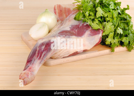 raw lamb meat with onion and spices Stock Photo