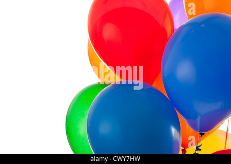 red, blue, green, orange, yellow, and purple balloons on a white background with copy space Stock Photo