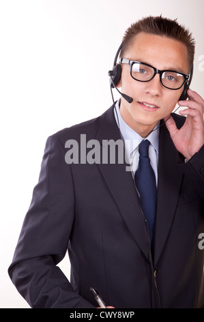 Portrait of a young attractive male secretary working. Stock Photo