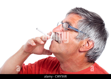 Elderly man smoking cigarette, isolated on white background. Stock Photo