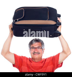 Senior man lifting luggage, isolated on white background. Stock Photo