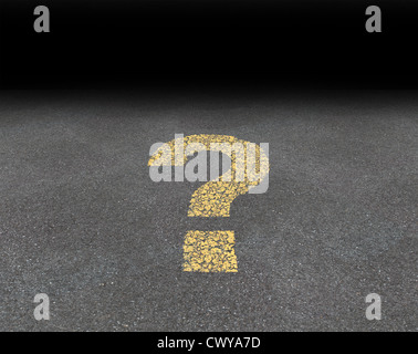 Question mark painted on an asphalt road as a symbol of strategy and decisions concept finding answers and solutions to confusing questions. Stock Photo