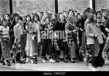 Bay City Rollers pop group boy band girl teens teen teenage teenagers fan fans Newcastle UK 1970s. They are wearing the tartan style fashion made popular by the Bay City Rollers  1970 HOMER SYKES Stock Photo