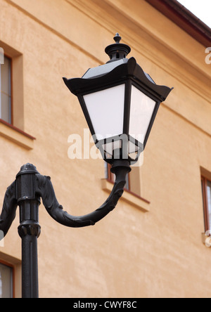 retro street lamp in front of building Stock Photo