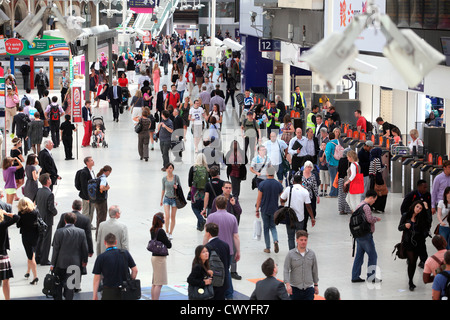 Commuters at Waterloo Station concourse in London UK. Stock Photo