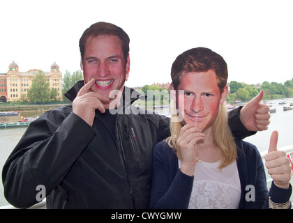 Prince William and Prince Harry masks at the Diamond Jubilee celebrations Stock Photo