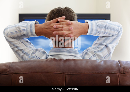 Watching tv Stock Photo