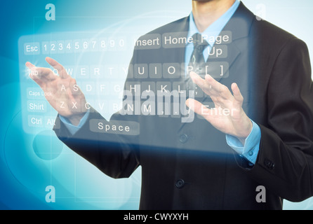 Businessman Hands pushing a button on a touch screen, virtual keyboard