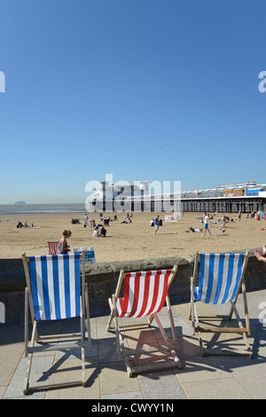 Deck chairs on seafront promenade, Weston-Super-Mare, Somerset, England, United Kingdom Stock Photo