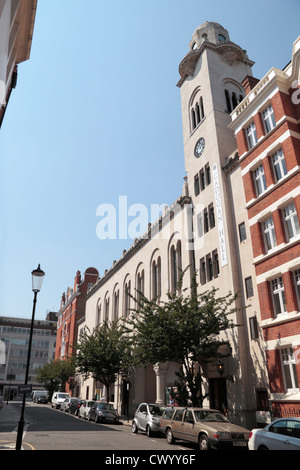 View along Sloane Terrace towards Cadogan Hall, home of the Royal Philharmonic Orchestra, Chelsea, London, UK. Stock Photo