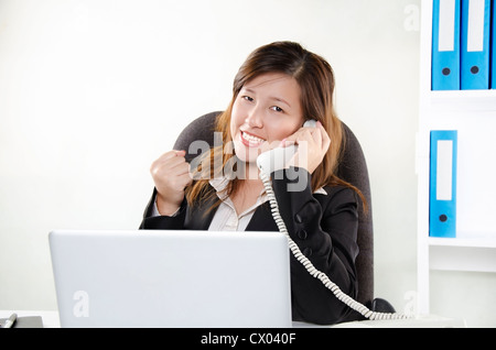 Cheerful young businesswoman Stock Photo
