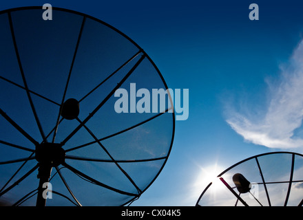 Two satellite dish with blue sky and cloud sunset time Stock Photo