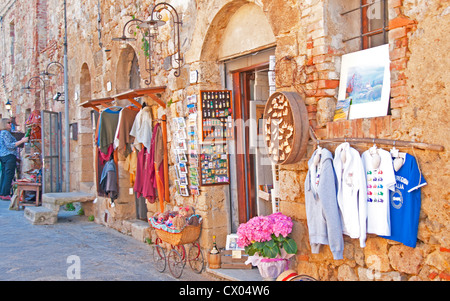 Typical scene on the Piazza Roma in Monteriggioni, Tuscany, Italy Stock Photo