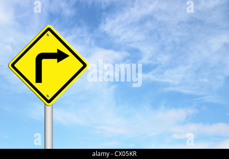 Road Sign - Right Turn Warning with blue sky blank for text Stock Photo