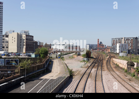The western approach to Manchester Victoria railway station with the former Exchnage station on the left, now a car park. Stock Photo